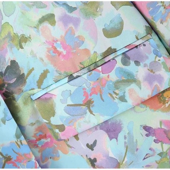 New floral suit. Never worn. Fits size medium. 35 or best offer. - Picture 5 of 6